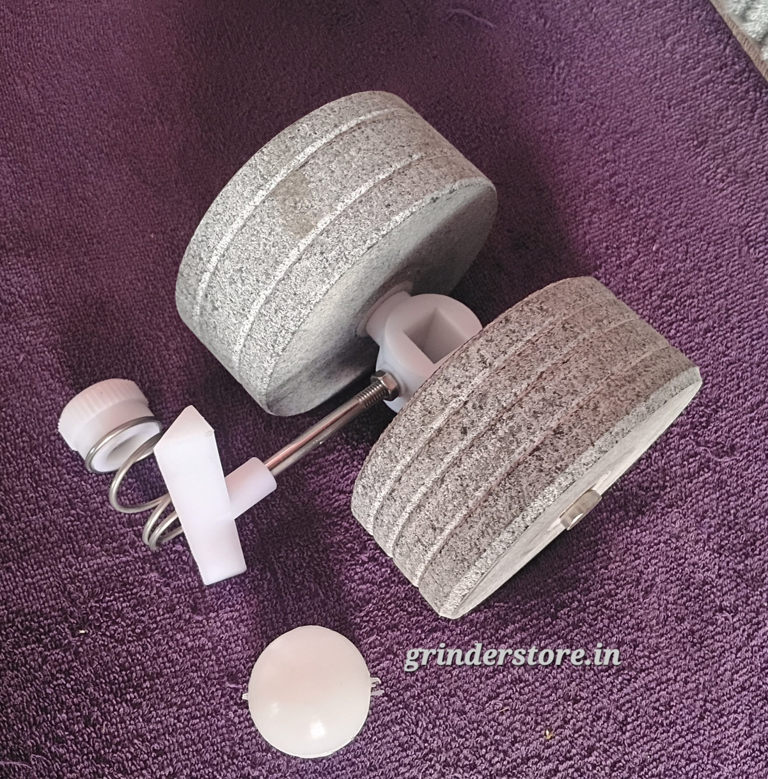 Tilting wet grinder roller stones set